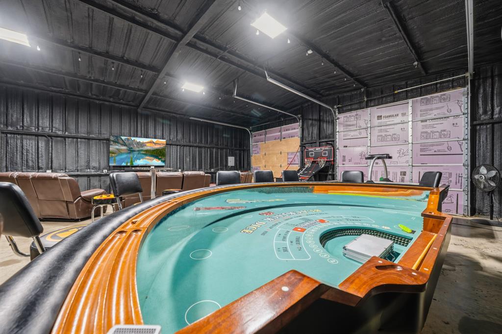 2731 Garrett Lane China Spring, TX 76633 - Photo 10 of 36 a view of a swimming pool with a chairs and a fireplace