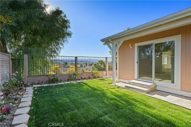 a view of a backyard with a garden
