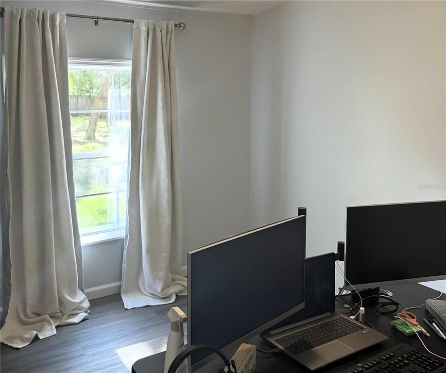 16314 Tiger Trail Spring Hill, FL 34610 - Photo 11 of 11 a desktop computer sitting on top of a desk