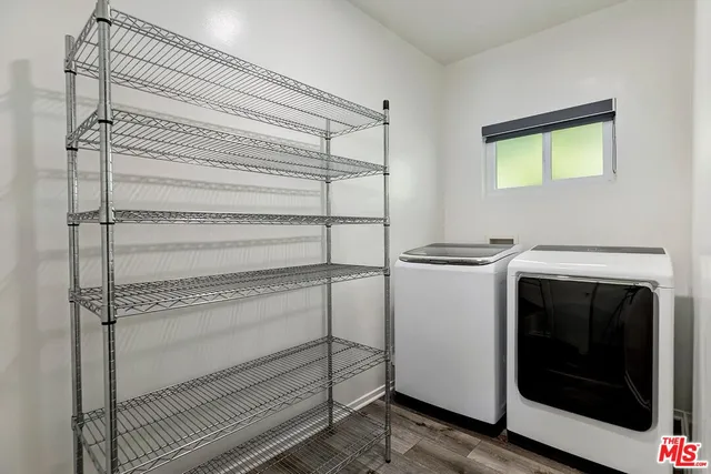 a utility room with washer and dryer