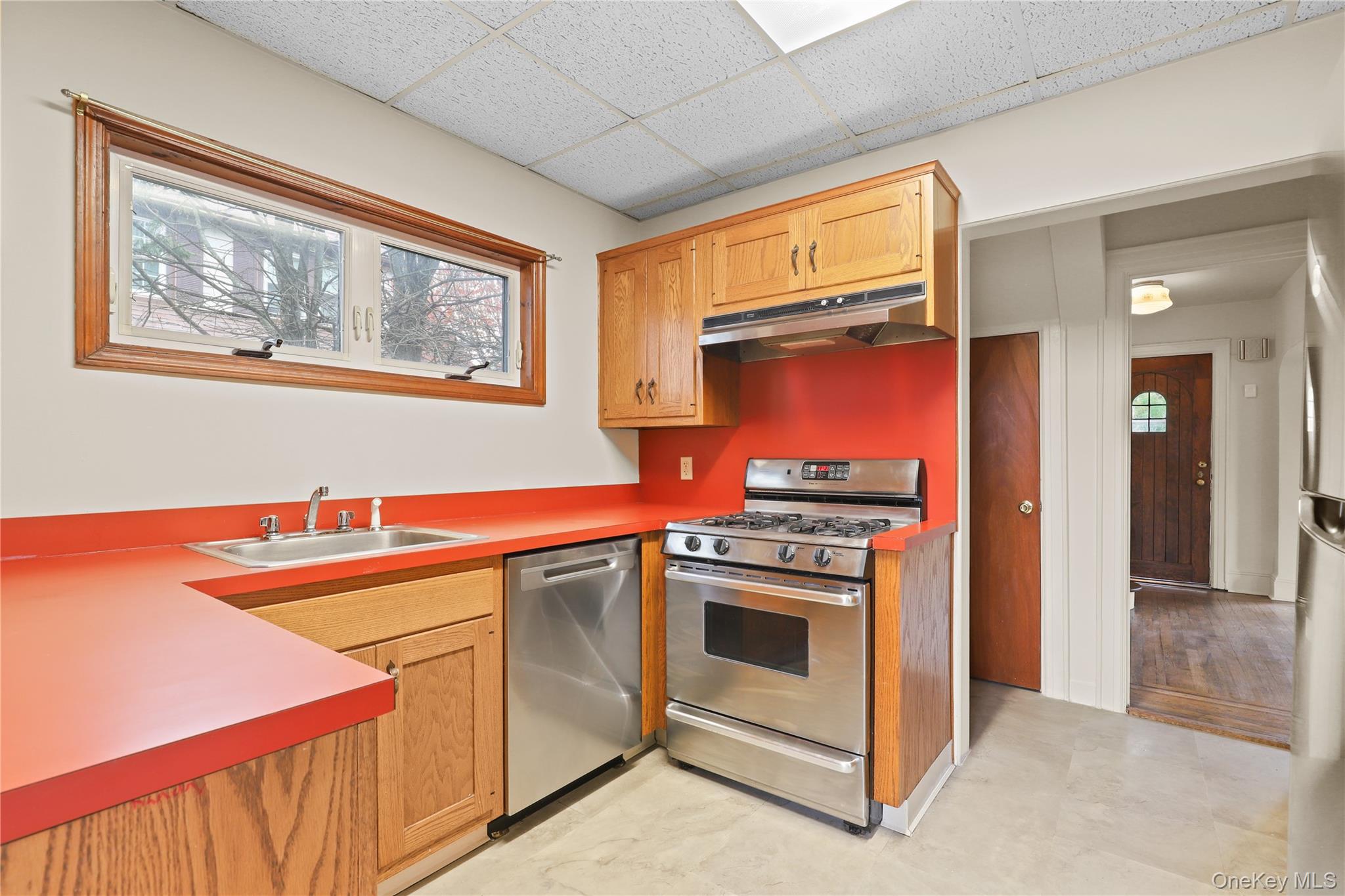 1 Rutgers Place Scarsdale, NY 10583 - Photo 21 of 29 a kitchen with stainless steel appliances a stove and a microwave