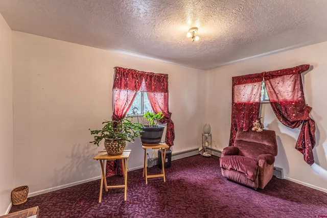 wooden floor with white walls