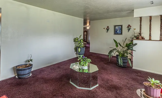 a vase of flowers sitting on a table