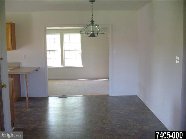 5782 Swamp Road Felton, PA 17322 - Photo 21 of 27 Dining Room into Bonus Rm