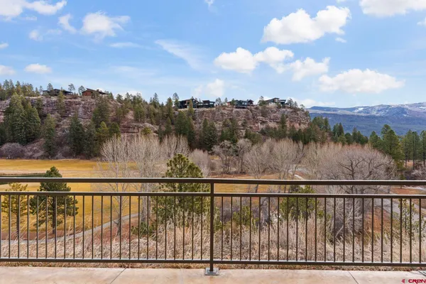 a view of a terrace with a lake view