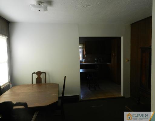 17 Ashley Road Edison, NJ 08817 - Photo 11 of 20 a room with a table and chairs