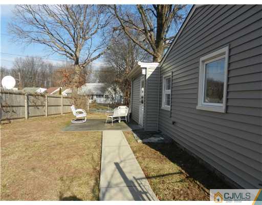 17 Ashley Road Edison, NJ 08817 - Photo 4 of 20 a view of yard along with trees