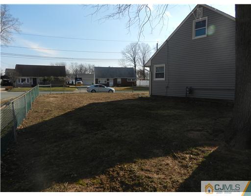 17 Ashley Road Edison, NJ 08817 - Photo 7 of 20 a view of a back yard of the house