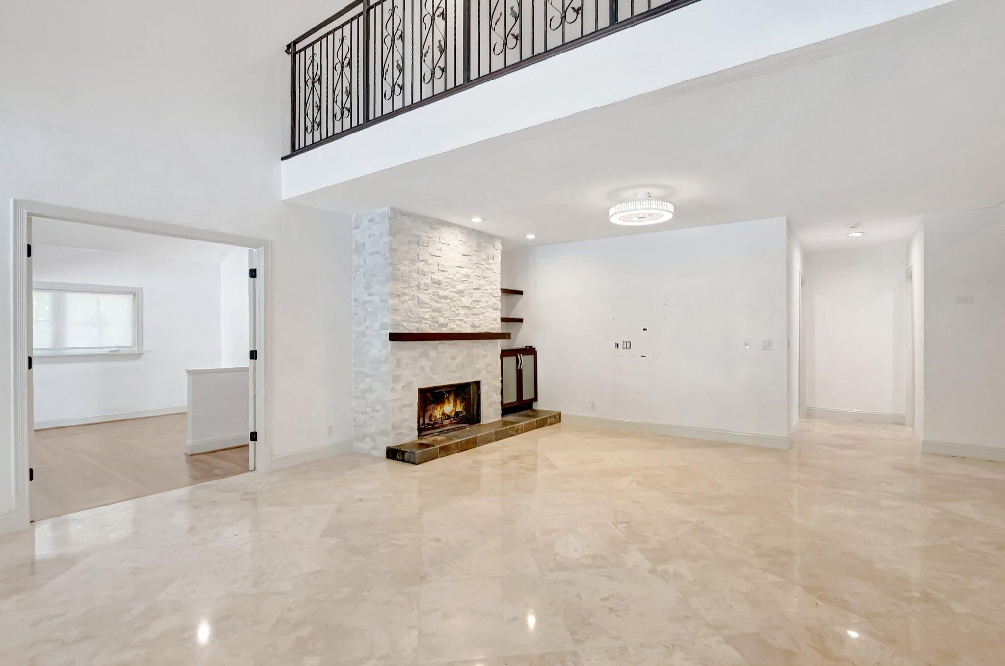 930 Parkside Circle North Boca Raton, FL 33486 - Photo 26 of 81 a view of empty room with fireplace
