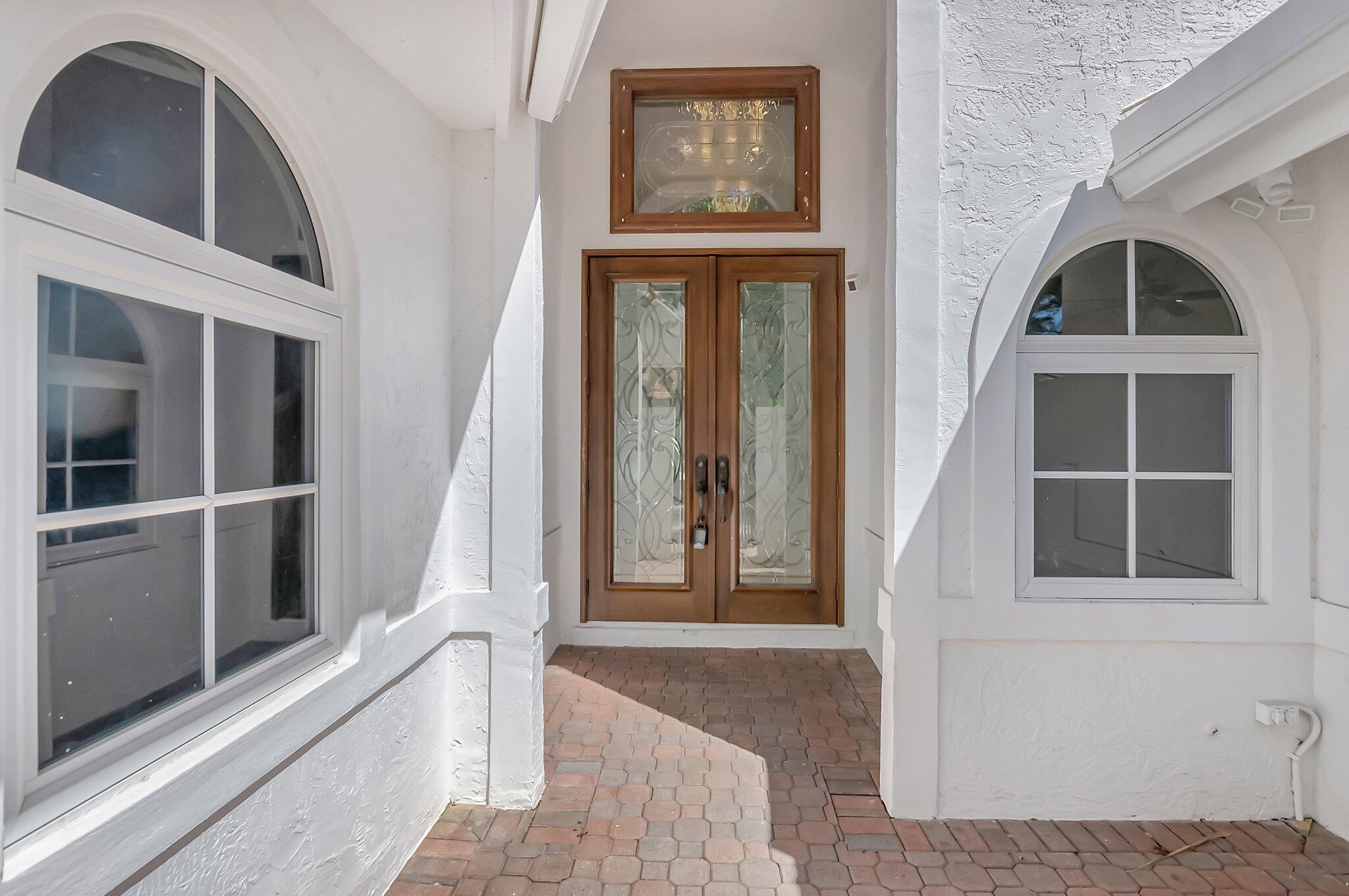 930 Parkside Circle North Boca Raton, FL 33486 - Photo 7 of 81 a view of front door of house