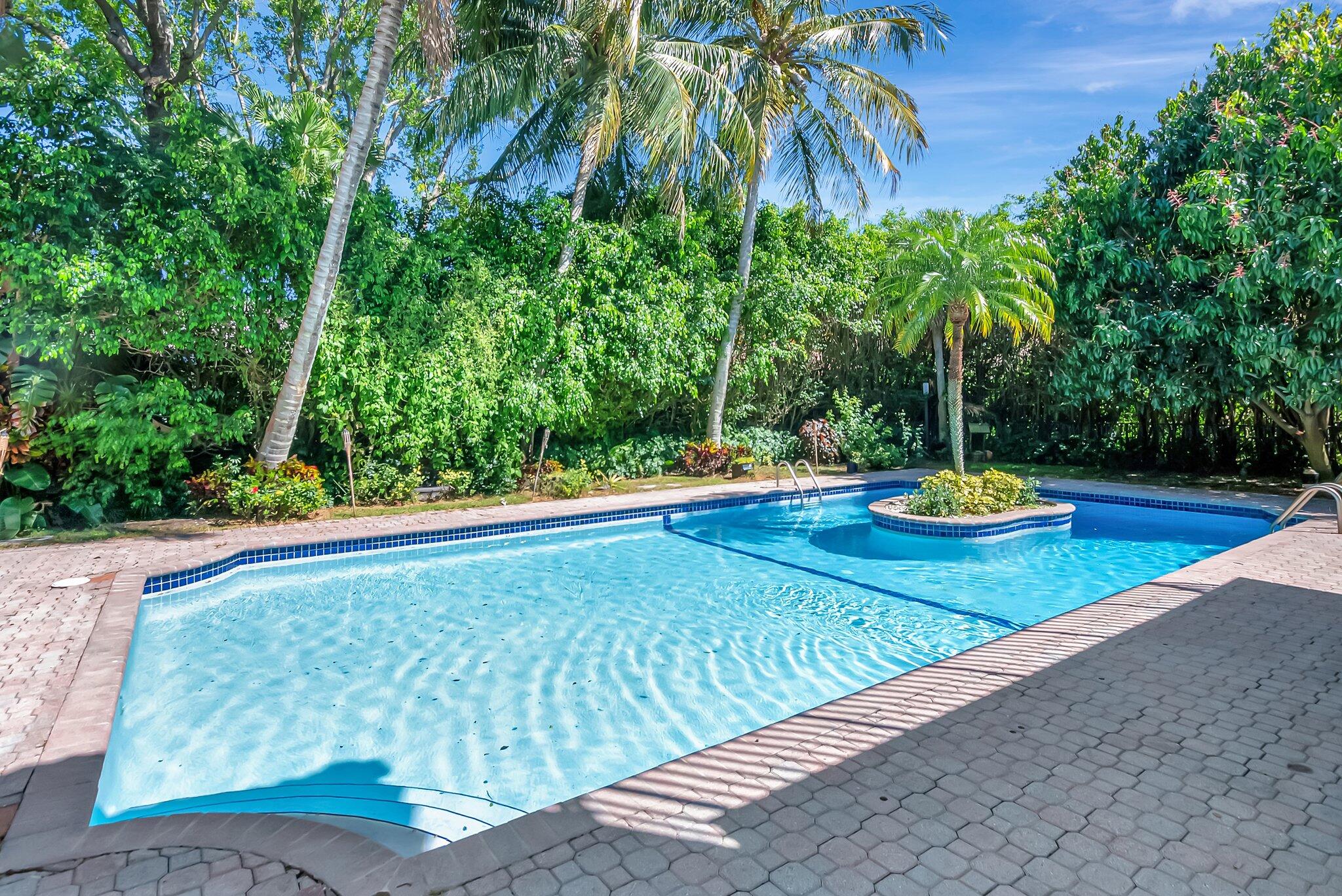 930 Parkside Circle North Boca Raton, FL 33486 - Photo 75 of 81 a view of swimming pool with a patio