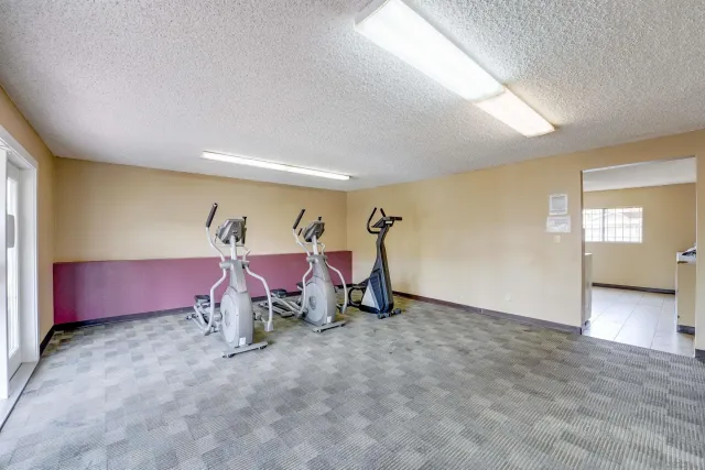 a view of a room with gym equipment