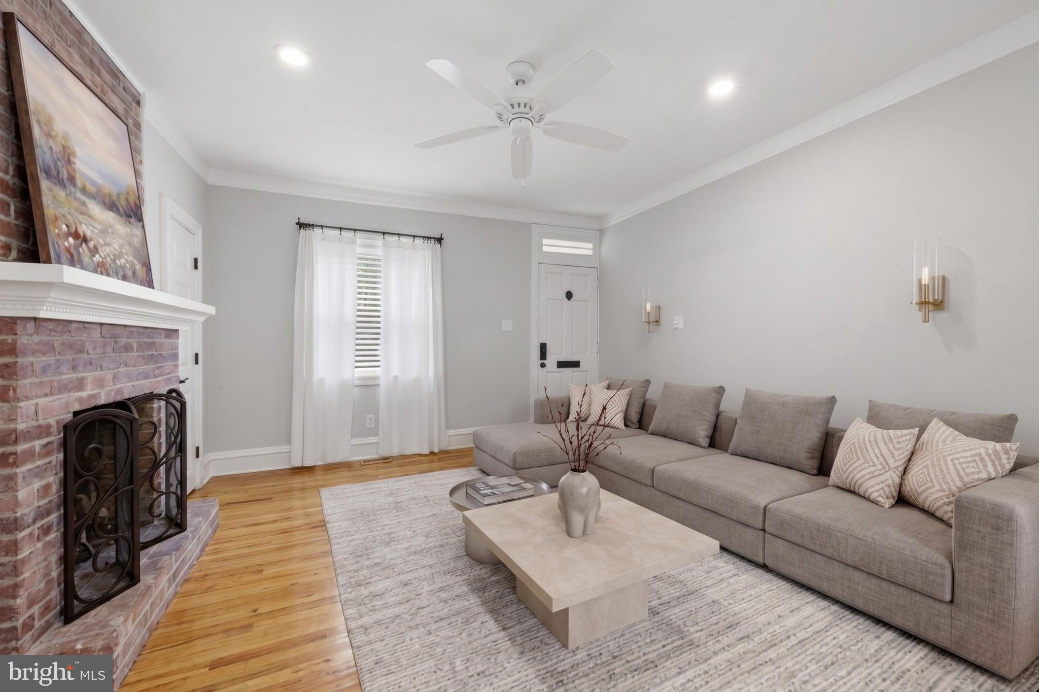 1917 Rodman Street Philadelphia, PA 19146 - Photo 1 of 31 a living room with furniture and a fireplace