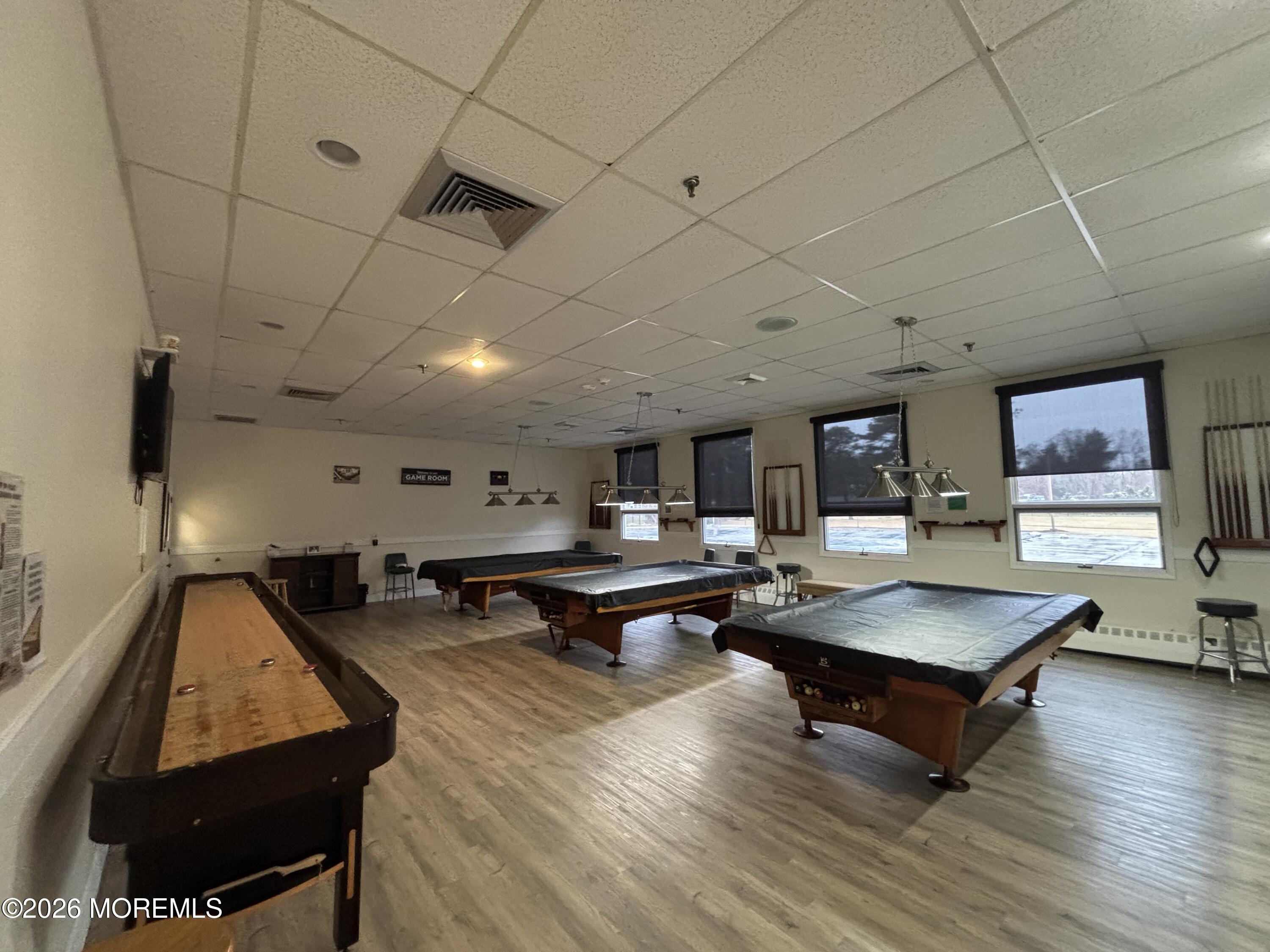 24 Olympus Way Brick, NJ 08724 - Photo 11 of 22 a living room with furniture pool table and a flat screen tv