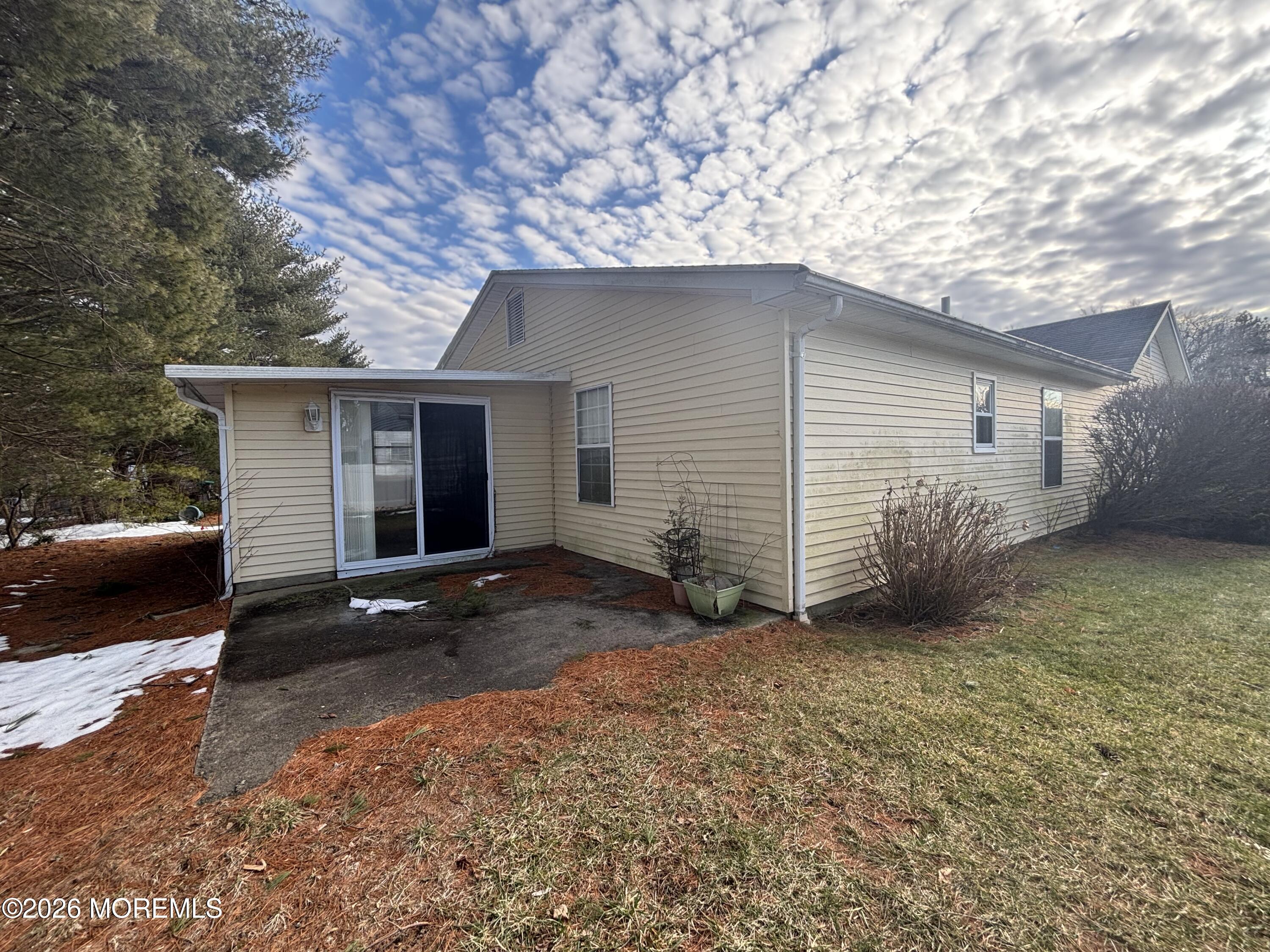 24 Olympus Way Brick, NJ 08724 - Photo 2 of 22 a backyard of a house