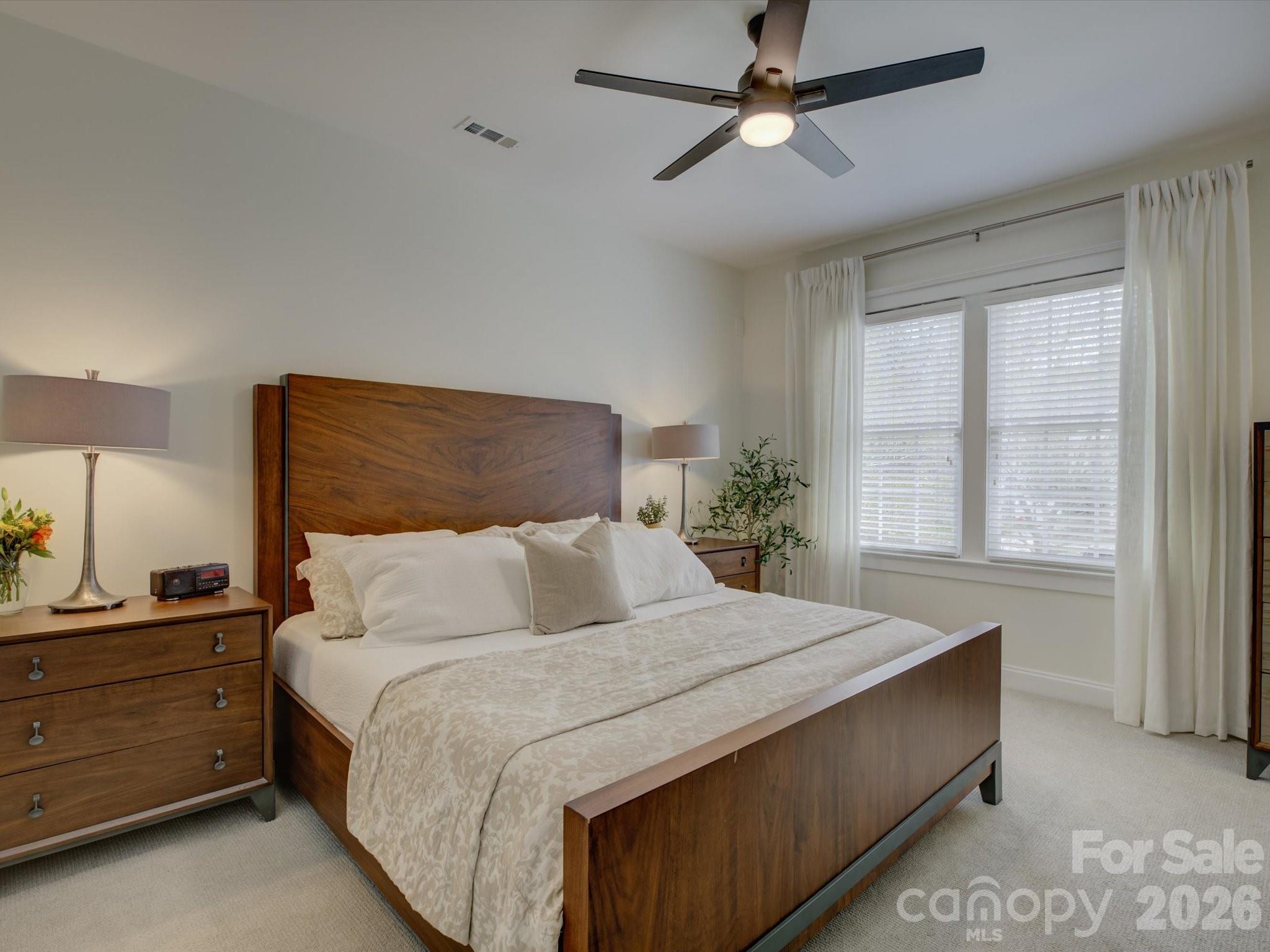 1305 Barnett Woods Crossing Fort Mill, SC 29708 - Photo 19 of 48 a bedroom with a bed and a window