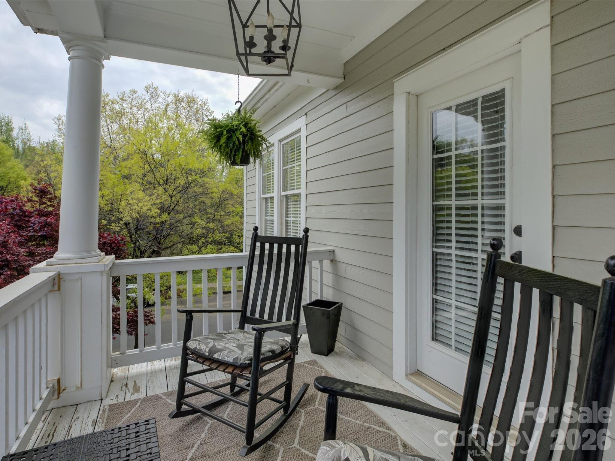 1305 Barnett Woods Crossing Fort Mill, SC 29708 - Photo 22 of 48 a view of a chair and table in the balcony