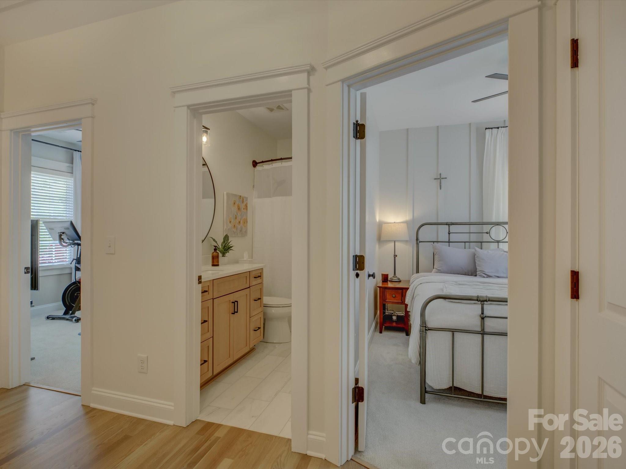 1305 Barnett Woods Crossing Fort Mill, SC 29708 - Photo 27 of 48 a en suite bathroom with a sink and a mirror