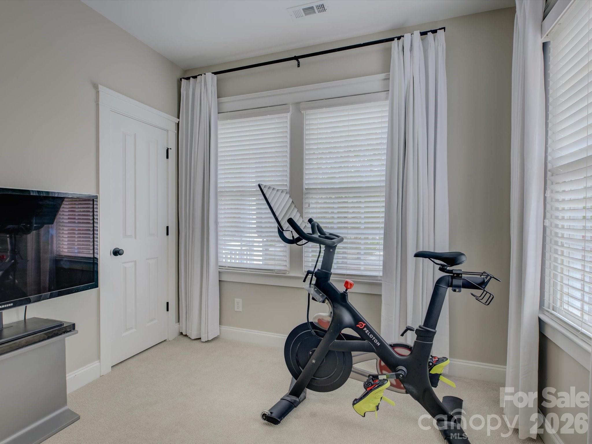 1305 Barnett Woods Crossing Fort Mill, SC 29708 - Photo 32 of 48 a view of a room with gym equipment