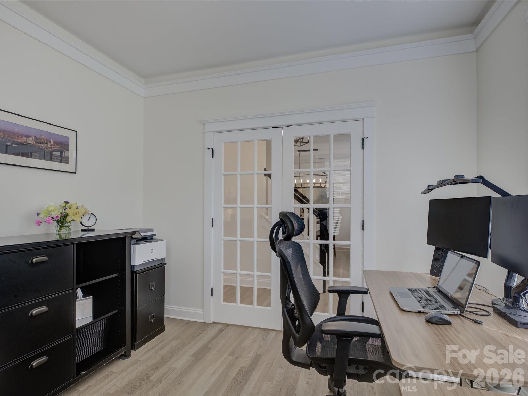 1305 Barnett Woods Crossing Fort Mill, SC 29708 - Photo 5 of 48 a work room with furniture and wooden floor