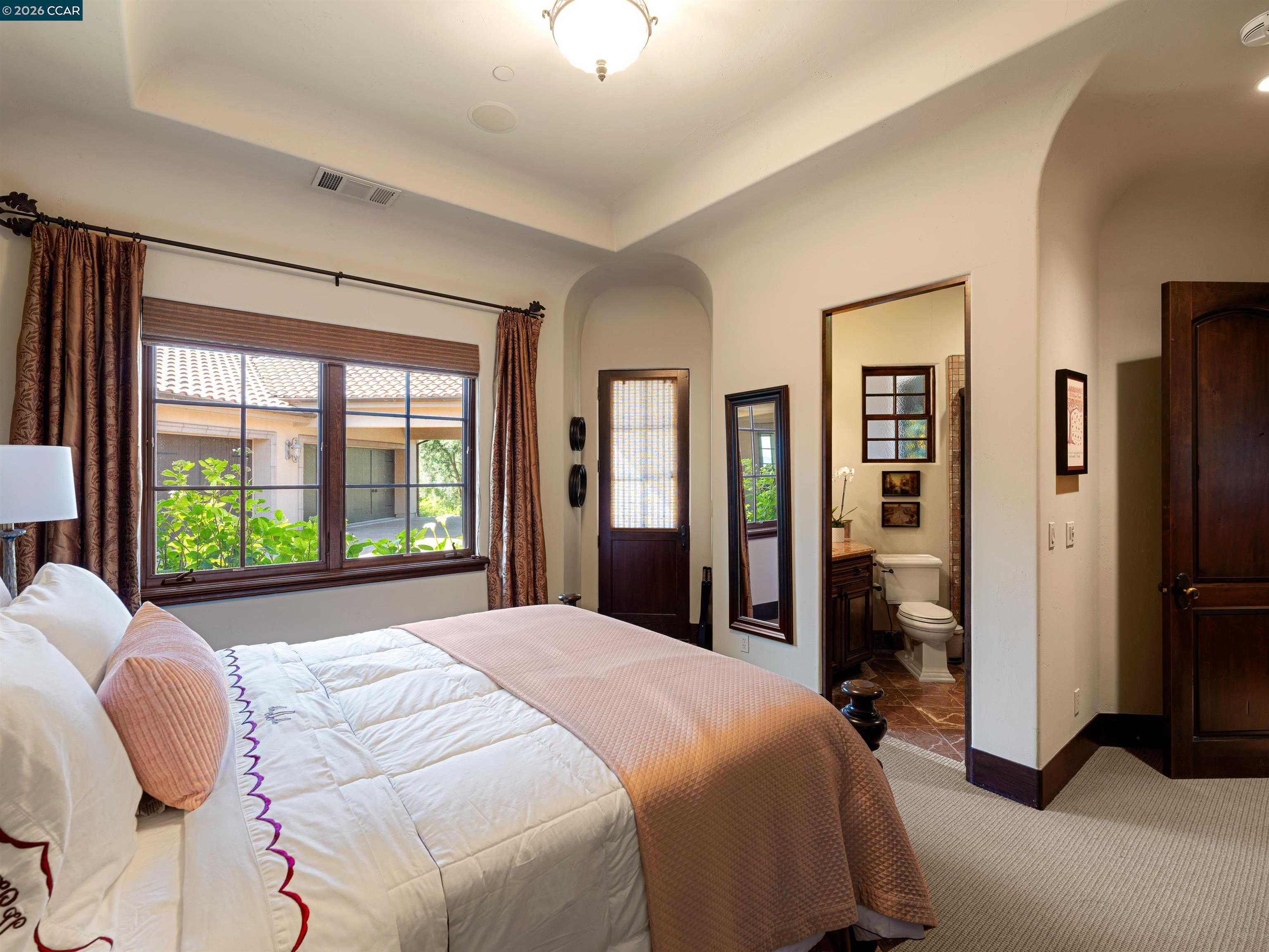 2020 Victorine Road Livermore, CA 94551 - Photo 56 of 99 a bedroom with a bed and a large window