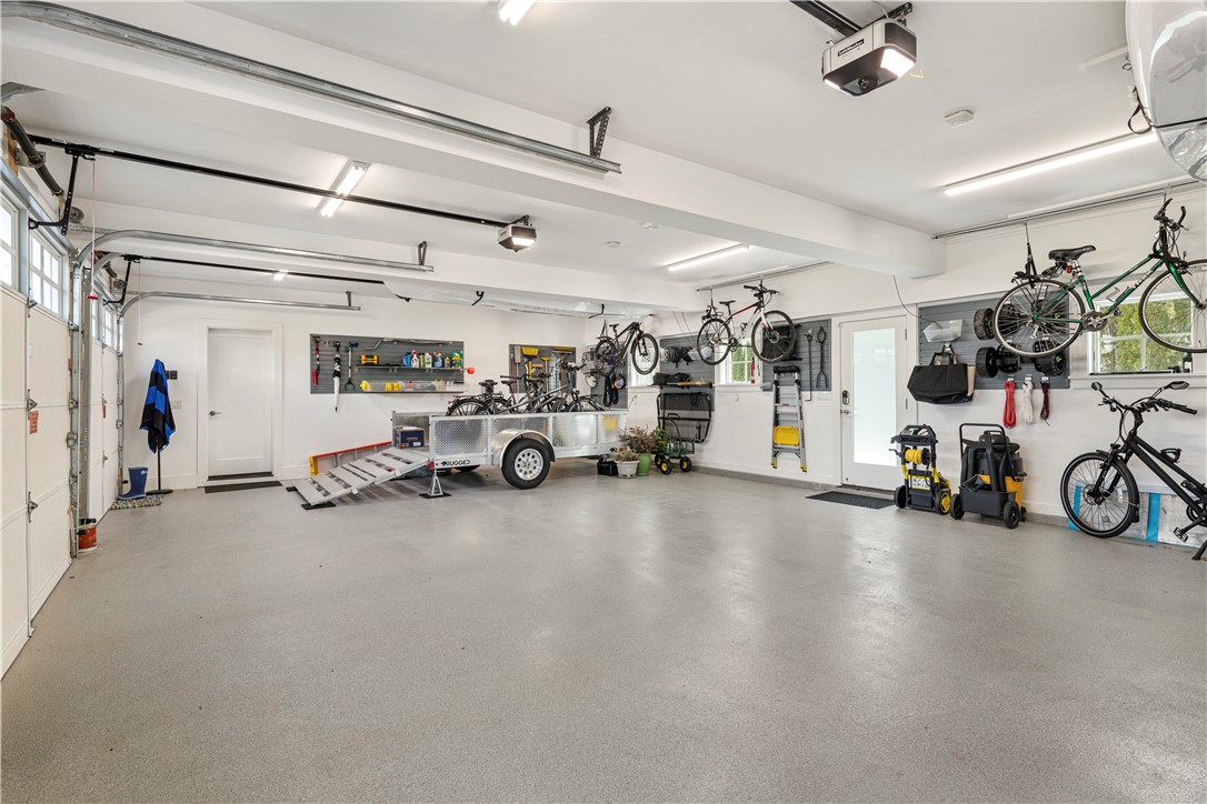 592 Tuckerman Avenue Middletown, RI 02842 - Photo 43 of 50 Oversized three car garage with plenty of room for toys.