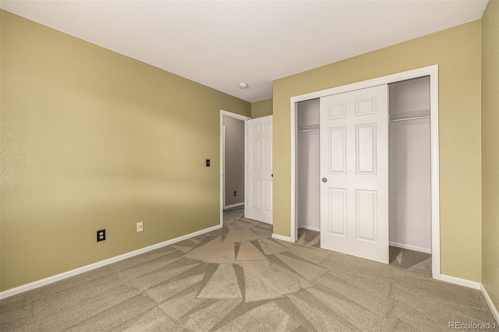 10244 Royal Eagle Street Highlands Ranch, CO 80129 - Photo 26 of 46 a view of an empty room