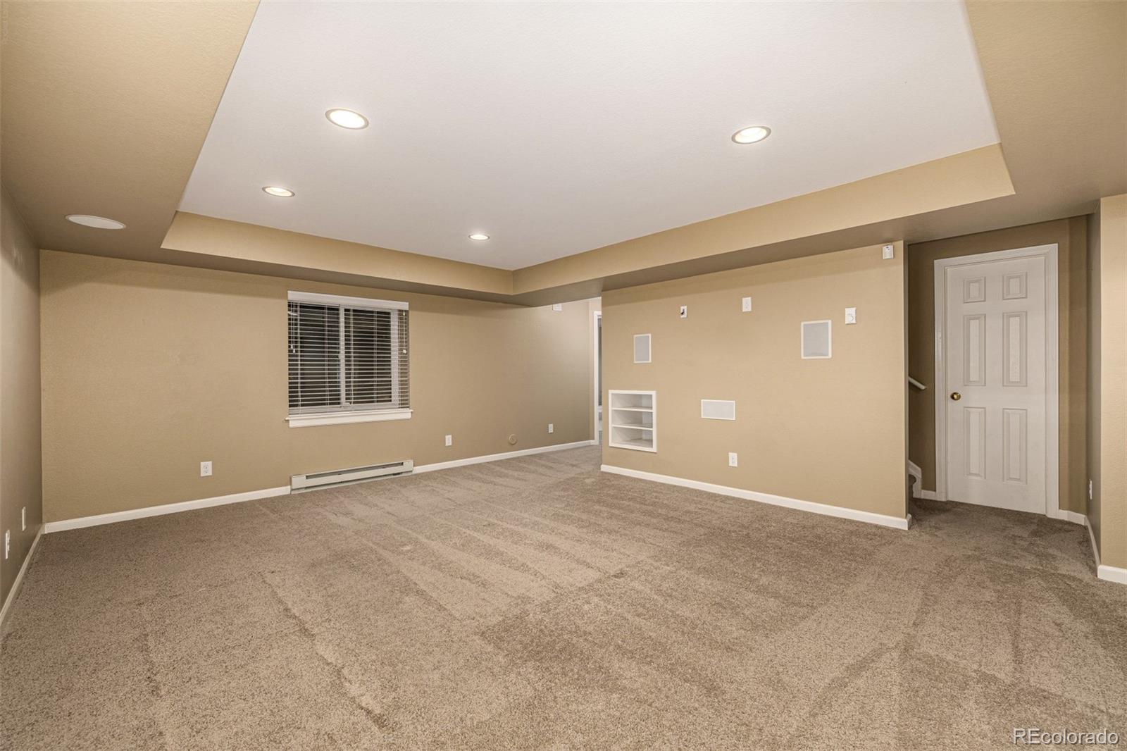 10244 Royal Eagle Street Highlands Ranch, CO 80129 - Photo 31 of 46 a view of an empty room with a window