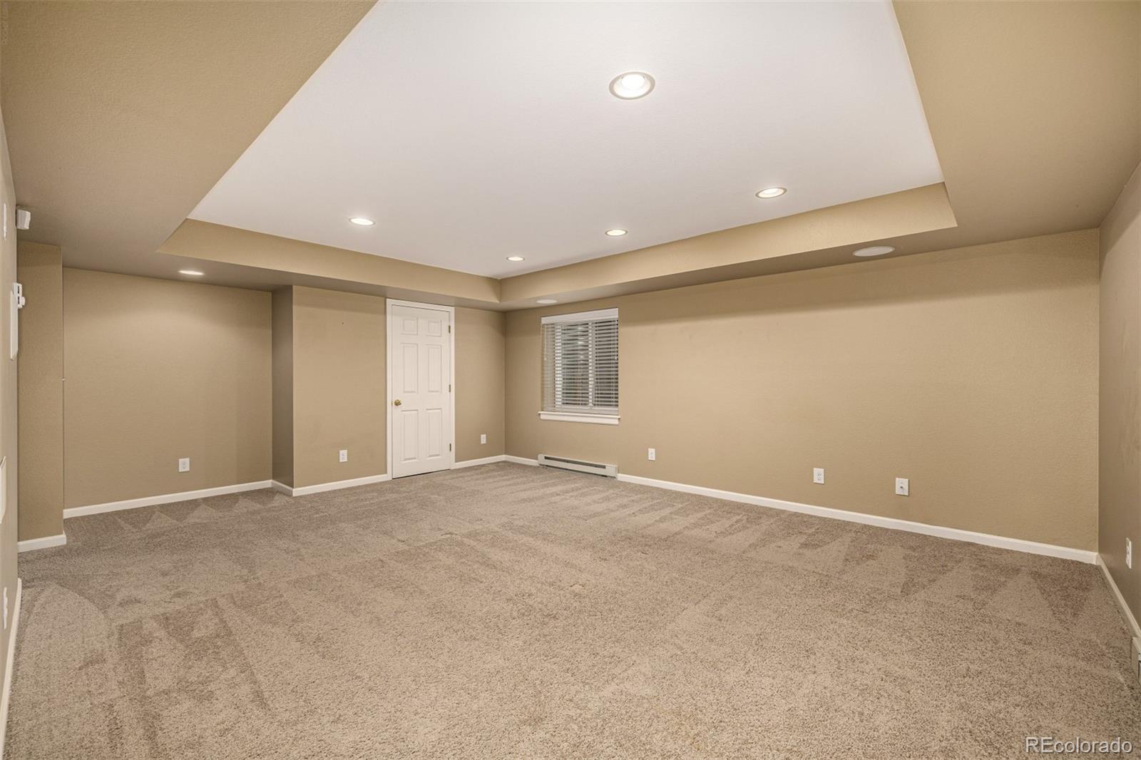 10244 Royal Eagle Street Highlands Ranch, CO 80129 - Photo 33 of 46 a view of an empty room with a window