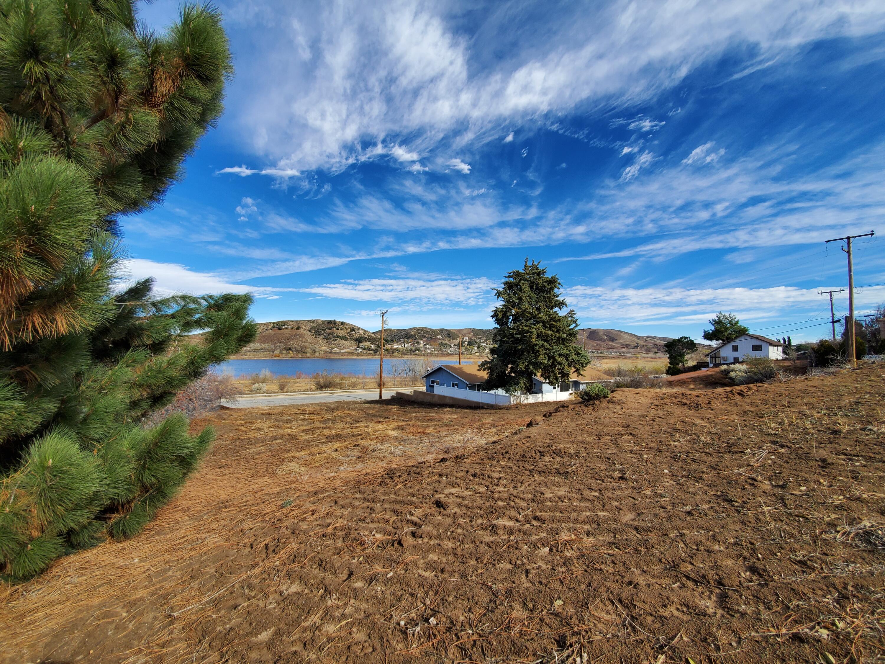 Chippewa Drive Lake Hughes, CA 93532 - Photo 11 of 31 a view of a dry yard with wooden fence