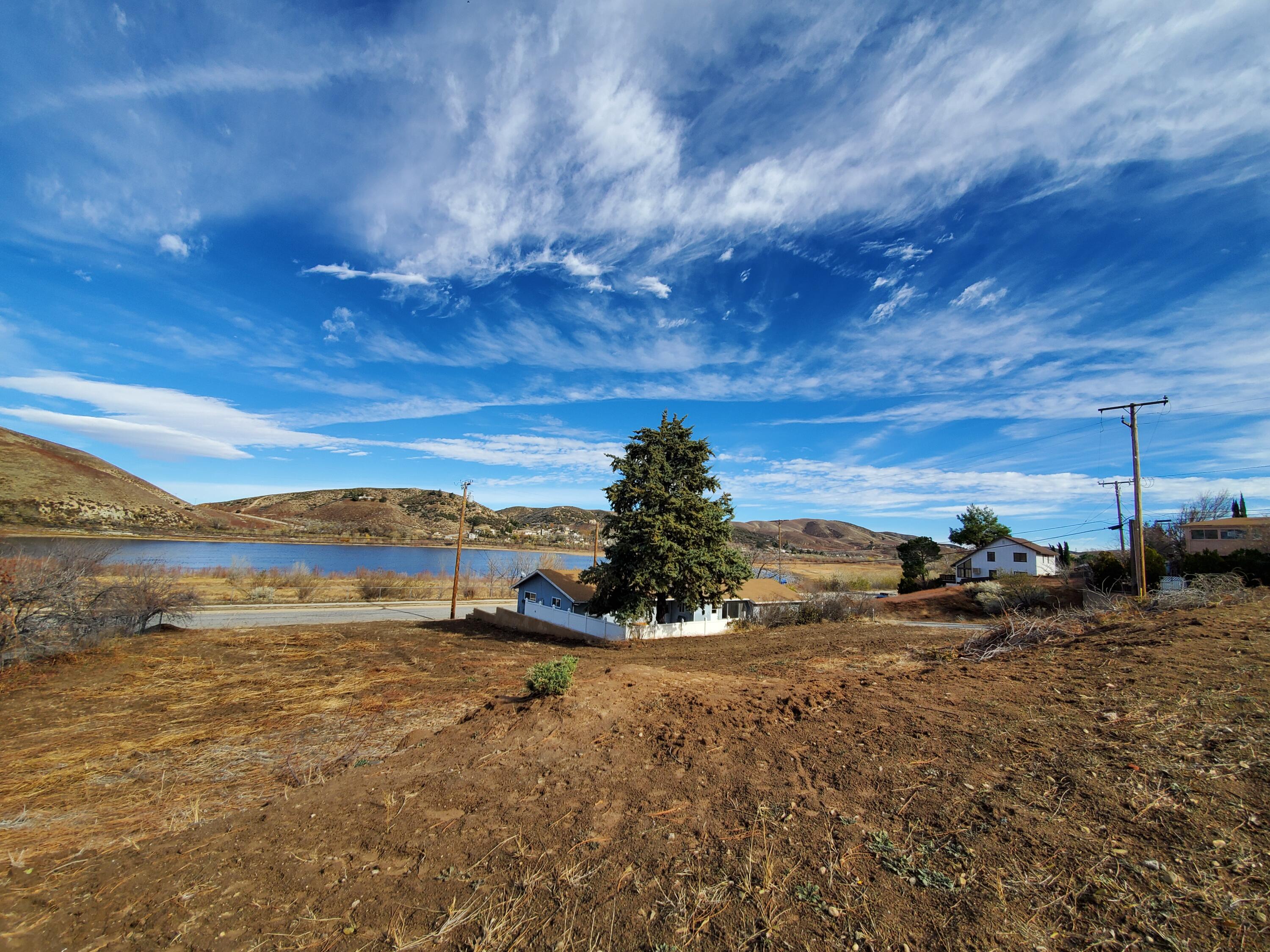 Chippewa Drive Lake Hughes, CA 93532 - Photo 9 of 31 a view of a lake with a mountain