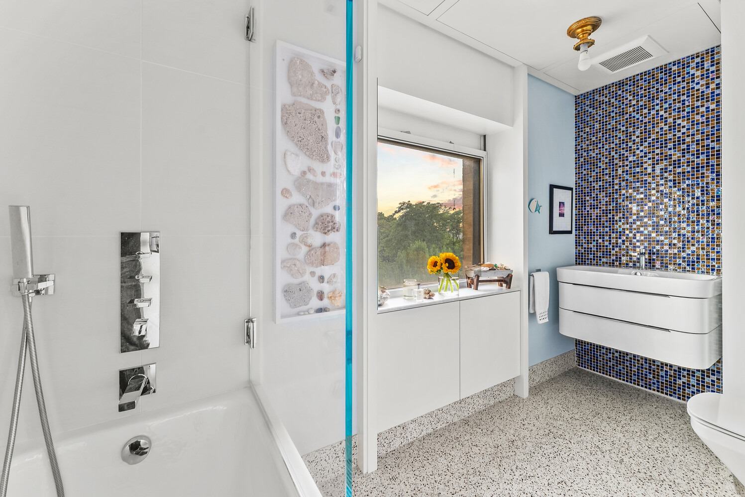 214 Riverside Drive, Unit 508/509 Manhattan, NY 10025 - Photo 12 of 17 a bathroom with a sink and a shower