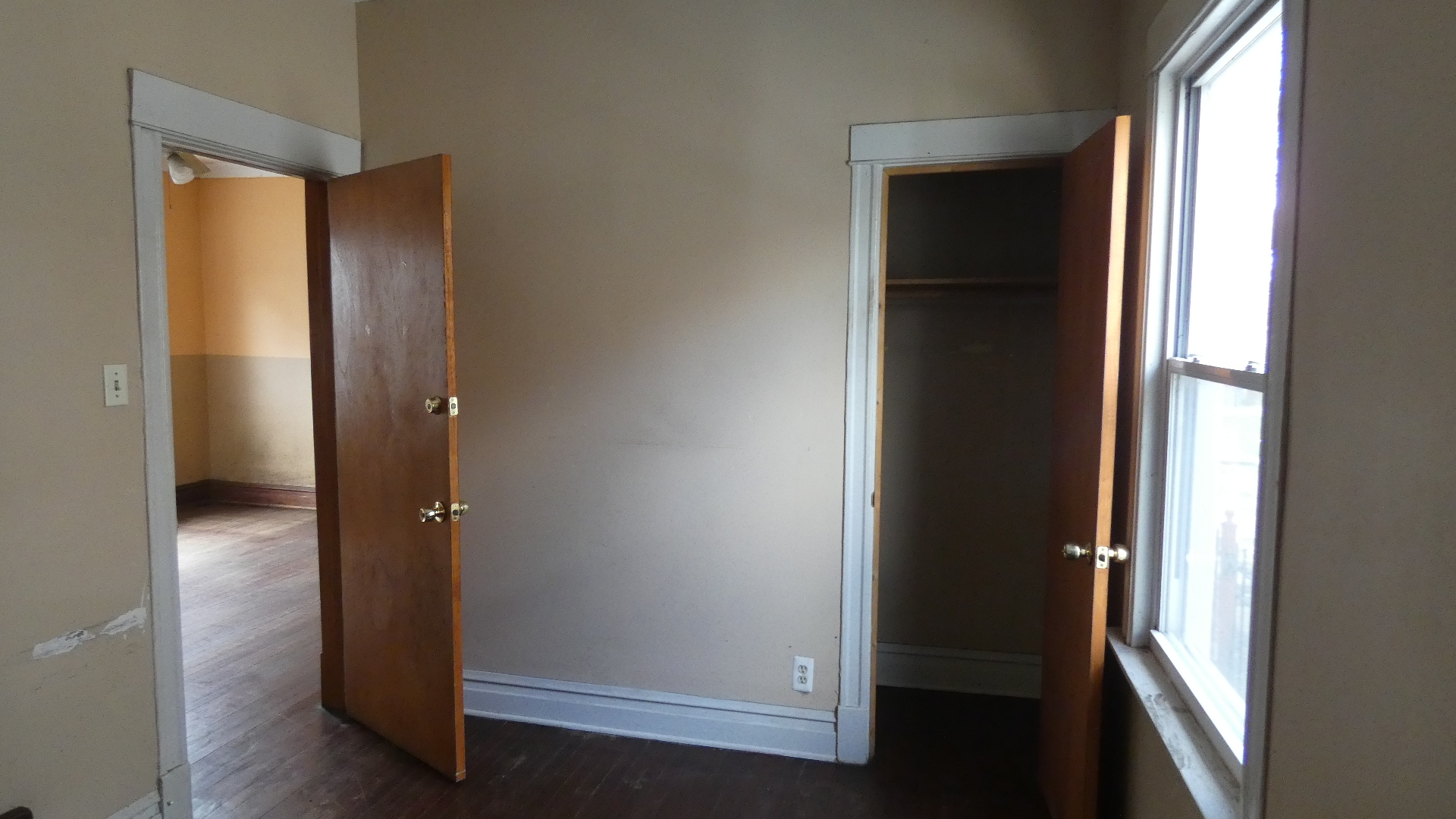 Undisclosed Address Chicago, IL 60628 - Photo 16 of 20 an empty room with windows and closet
