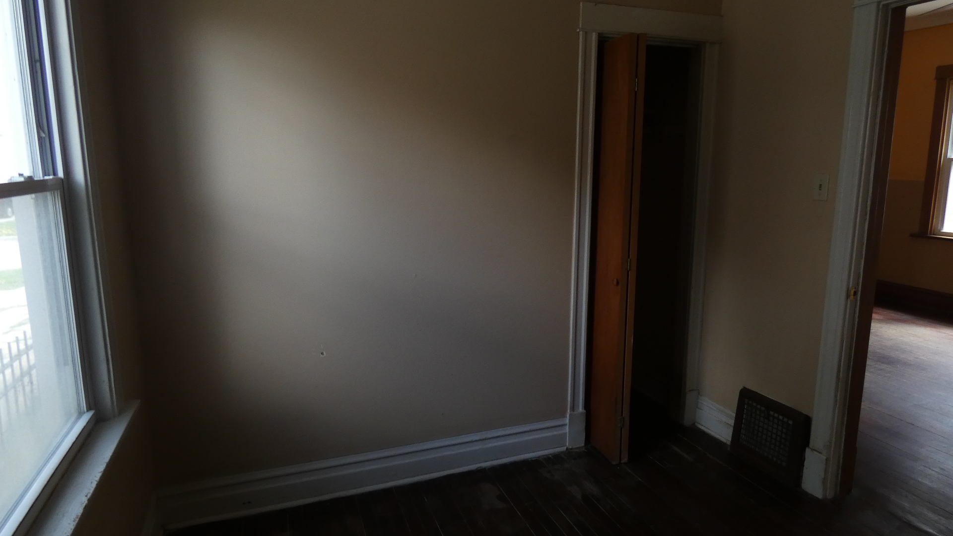 Undisclosed Address Chicago, IL 60628 - Photo 17 of 20 an empty room and a window