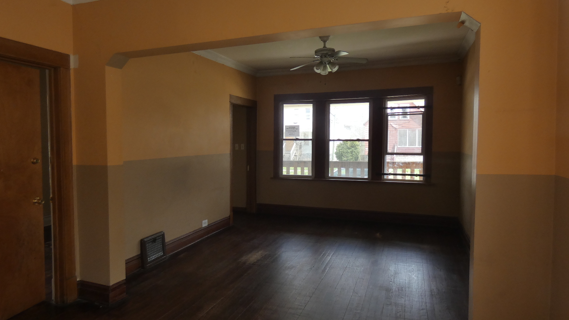 Undisclosed Address Chicago, IL 60628 - Photo 5 of 20 a view of an empty room with a window