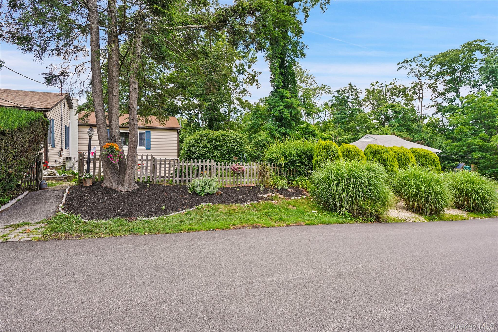 18 Sylvan Road Lake Peekskill, NY 10537 - Photo 39 of 50 Beautiful gardens and mature plantings gives this home wonderful curb appeal