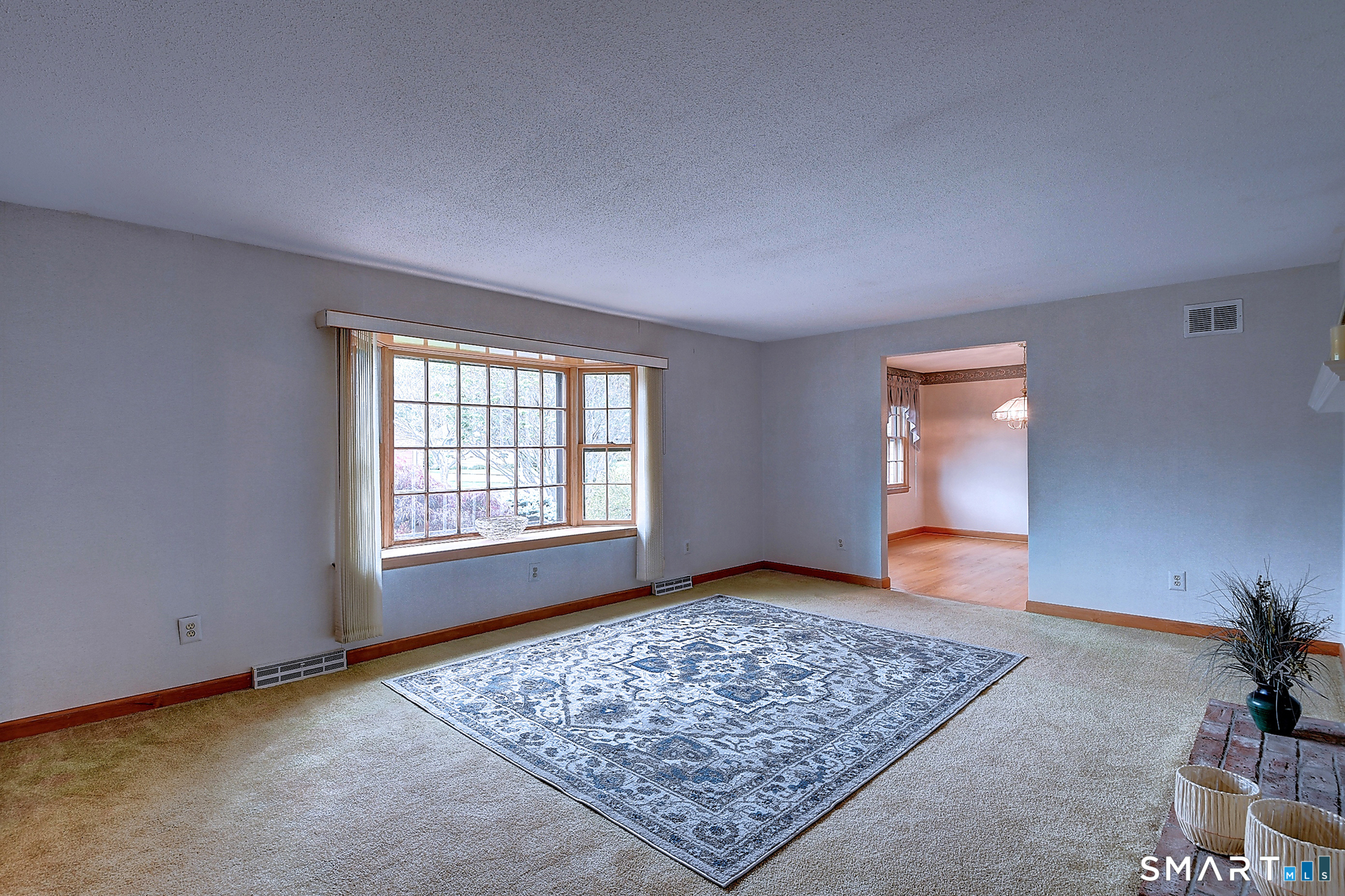 80 Grist Mill Road Wethersfield, CT 06109 - Photo 9 of 40 a view of an empty room and window
