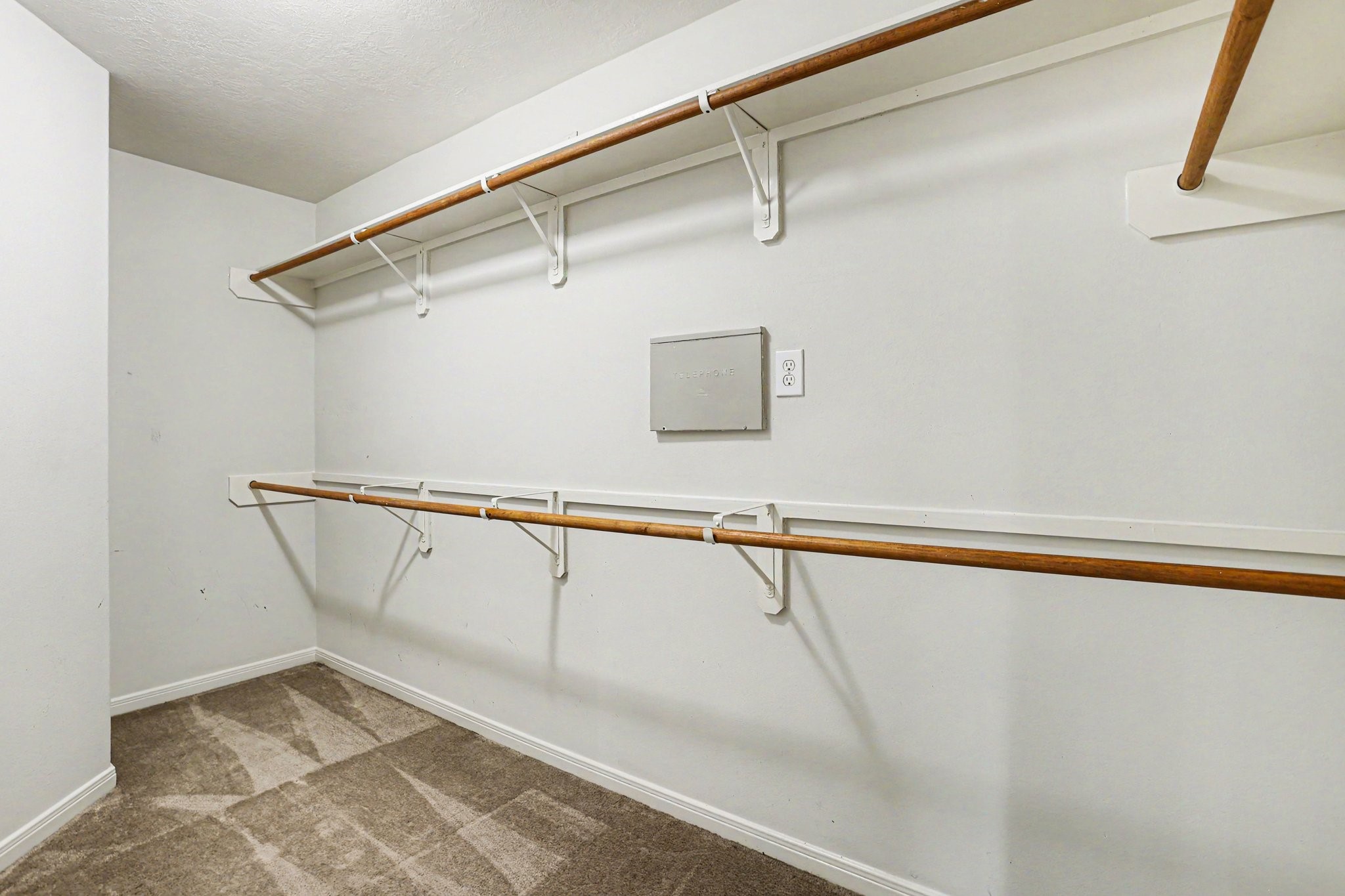 25222 Ginger Ranch Drive Katy, TX 77494 - Photo 25 of 33 Walk-in to this spacious closet off of the primary ensuite bathroom complete with double hanging rods for ample clothing storage.
