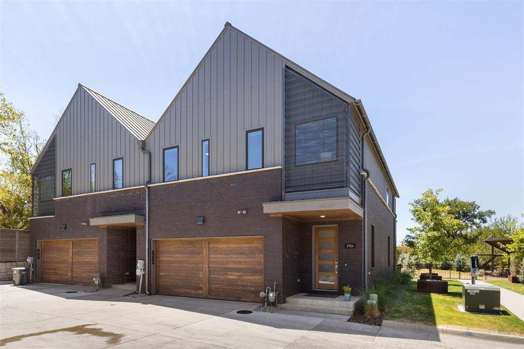 a view of a house with a garage