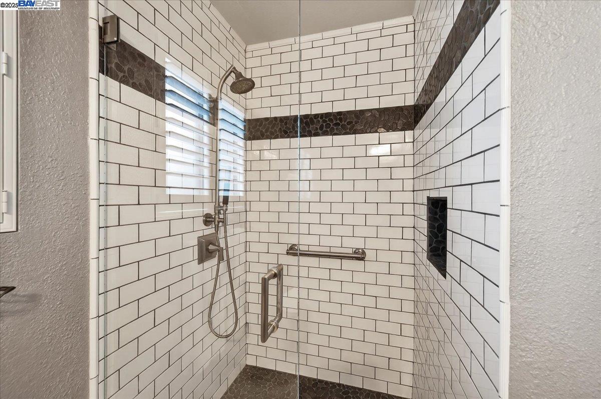 7875 Canyon Meadows Circle, Unit C Pleasanton, CA 94588 - Photo 18 of 32 a bathroom with a shower