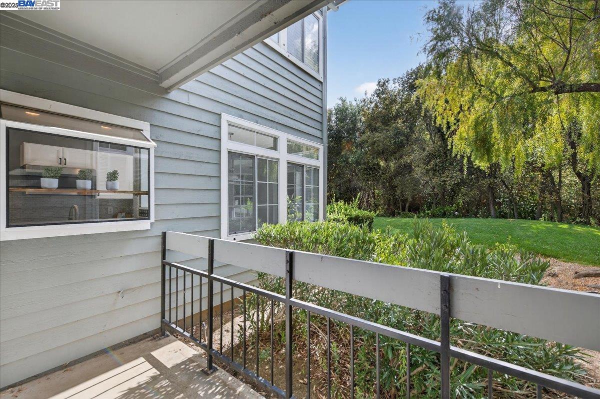 7875 Canyon Meadows Circle, Unit C Pleasanton, CA 94588 - Photo 24 of 32 a view of a porch with a yard