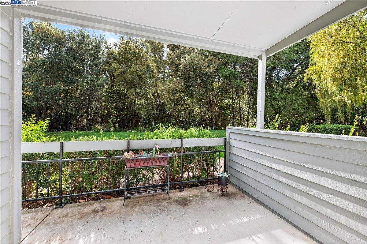 7875 Canyon Meadows Circle, Unit C Pleasanton, CA 94588 - Photo 8 of 32 a view of a bench in a yard