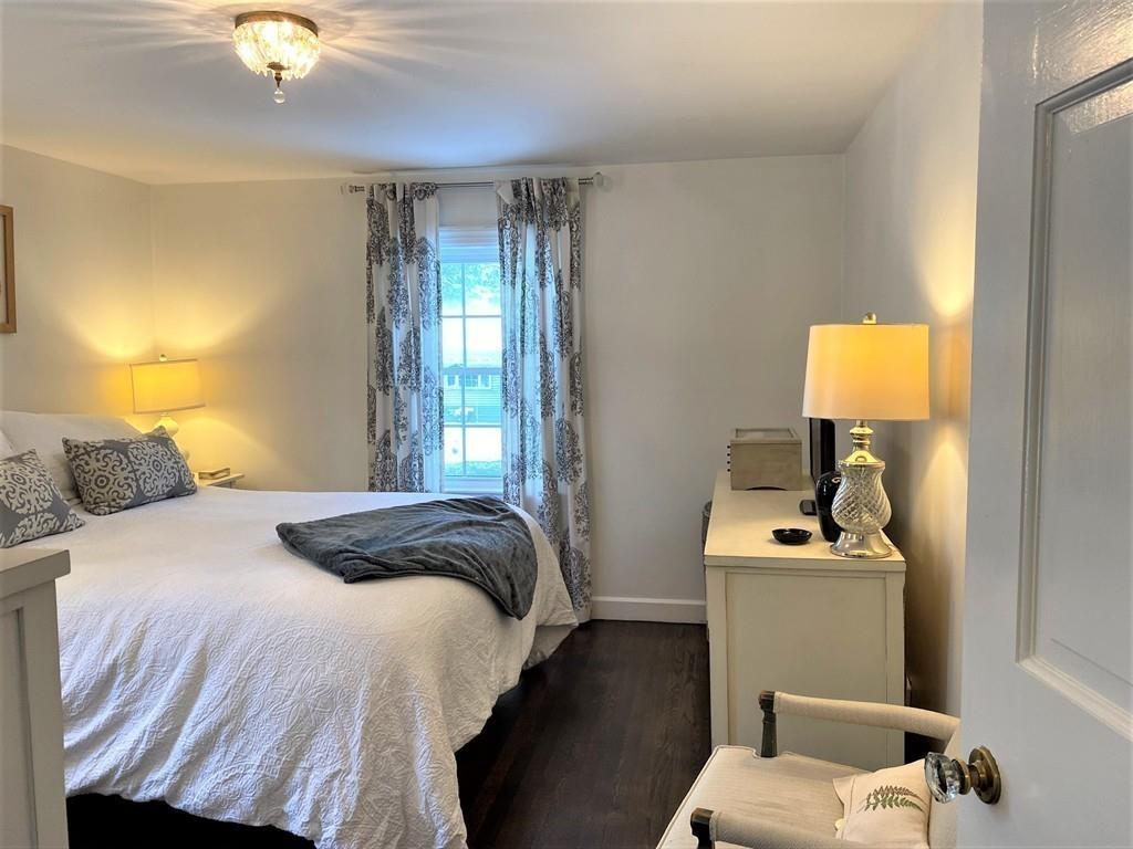 6 Dartmouth Road Marblehead, MA 01945 - Photo 13 of 21 a bedroom with a bed and a window