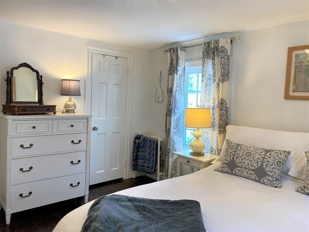 6 Dartmouth Road Marblehead, MA 01945 - Photo 14 of 21 a bedroom with a bed and a dresser