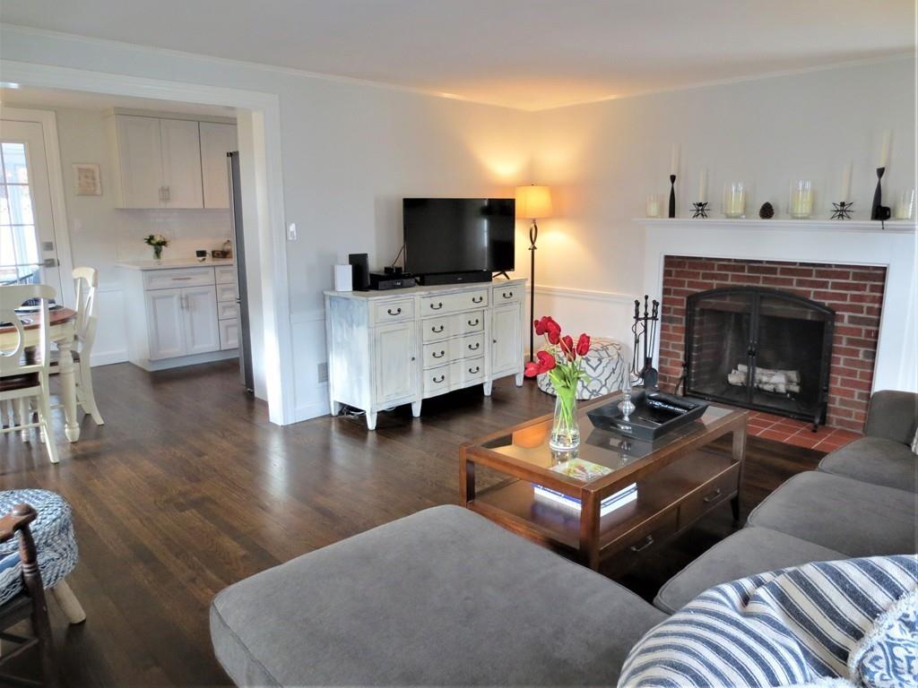 6 Dartmouth Road Marblehead, MA 01945 - Photo 4 of 21 a living room with furniture and a fireplace