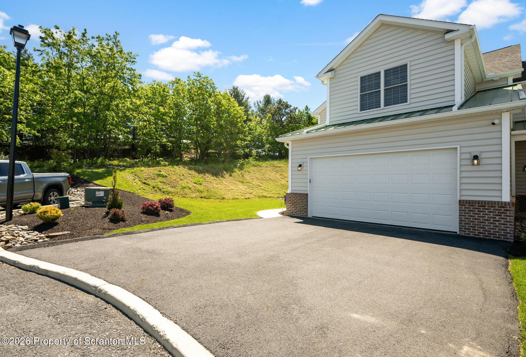 3701 Sinclair Cl, Unit 37A Moosic, PA 18507 - Photo 35 of 36 Side view
