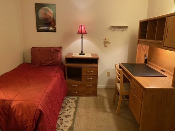 12 Wedgemere Road Beverly, MA 01915 - Photo 7 of 10 a bedroom with a bed and a dresser
