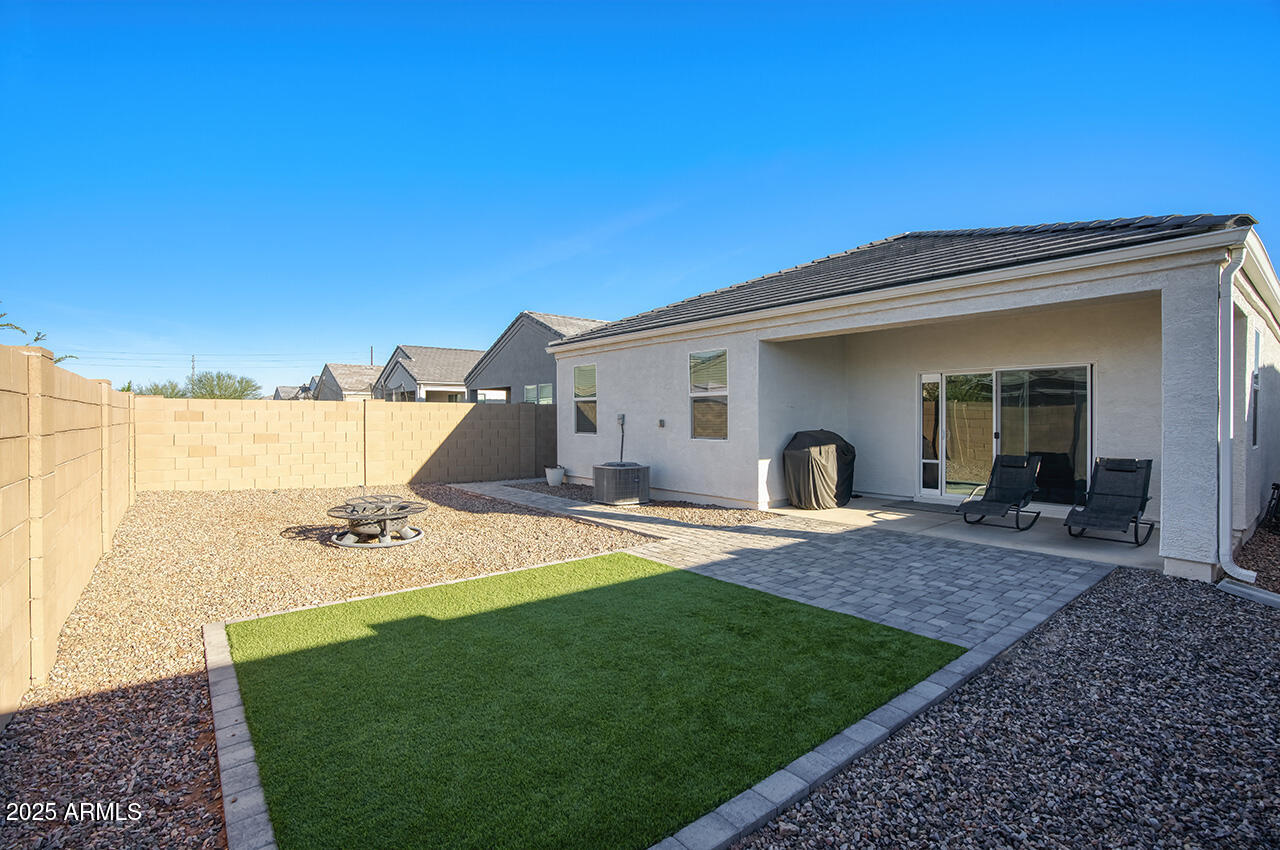 5236 East Emery Road San Tan Valley, AZ 85143 - Photo 15 of 24 a view of an house with backyard porch and outdoor kitchen