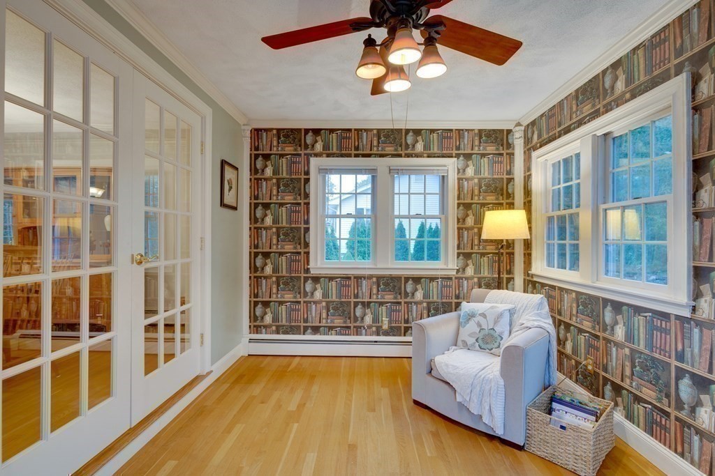 11 Milepost Road Reading, MA 01867 - Photo 18 of 29 a living room with furniture and a large window