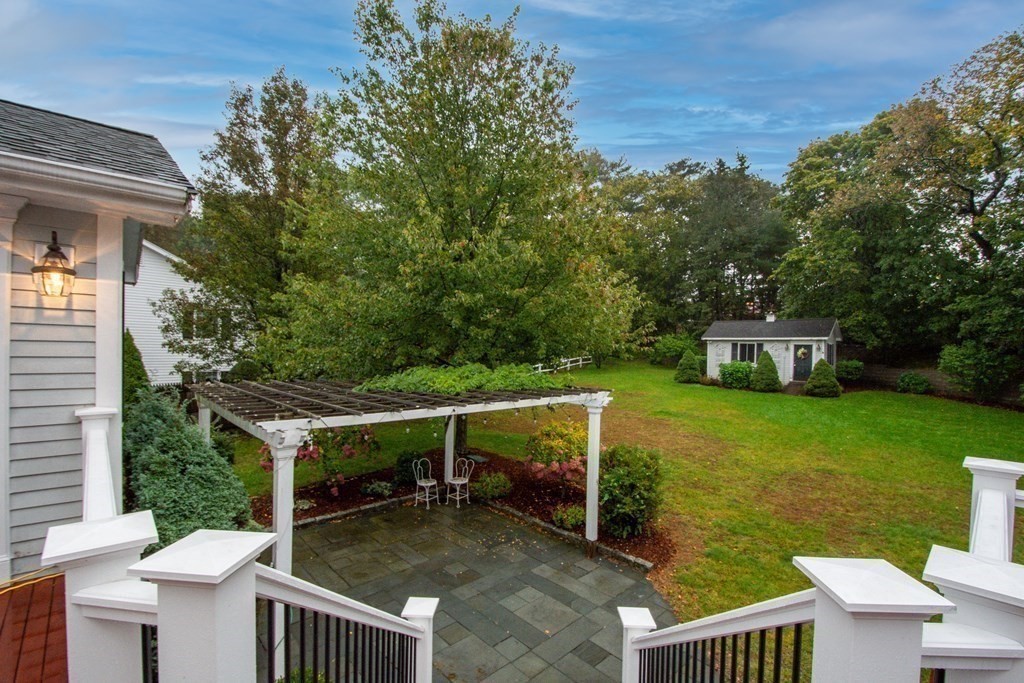 11 Milepost Road Reading, MA 01867 - Photo 27 of 29 a view of a chair and table on the garden